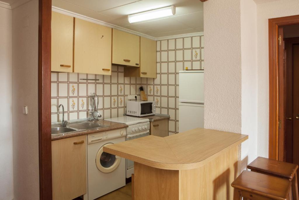 Kuchyňa alebo kuchynka v ubytovaní Apartamentos Florazar II Ajhory