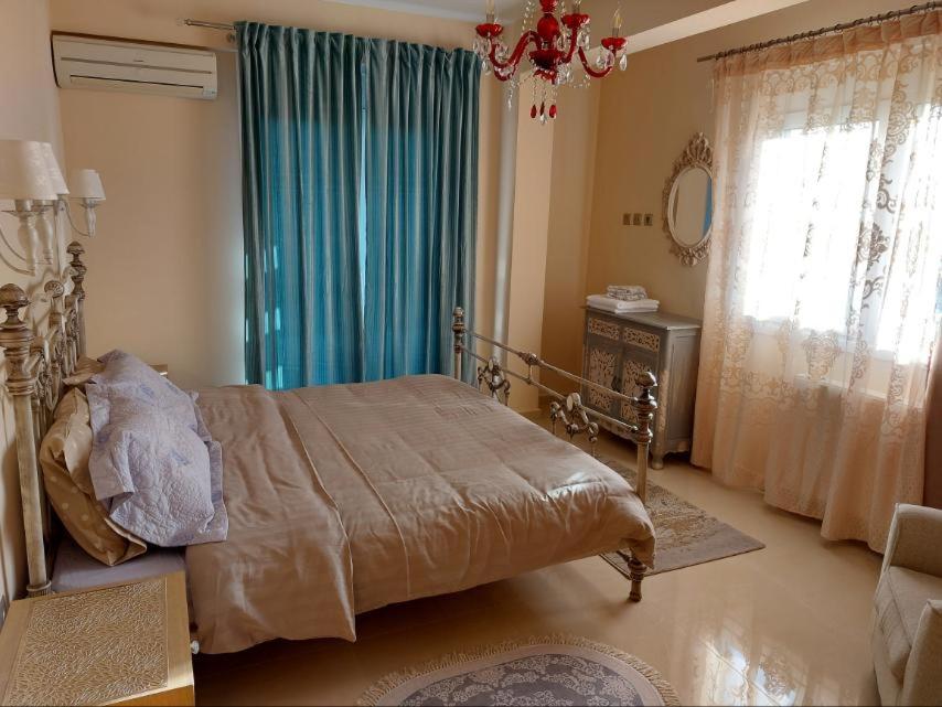 Postel nebo postele na pokoji v ubytování Elegant View - Trikala - 3BD Apt