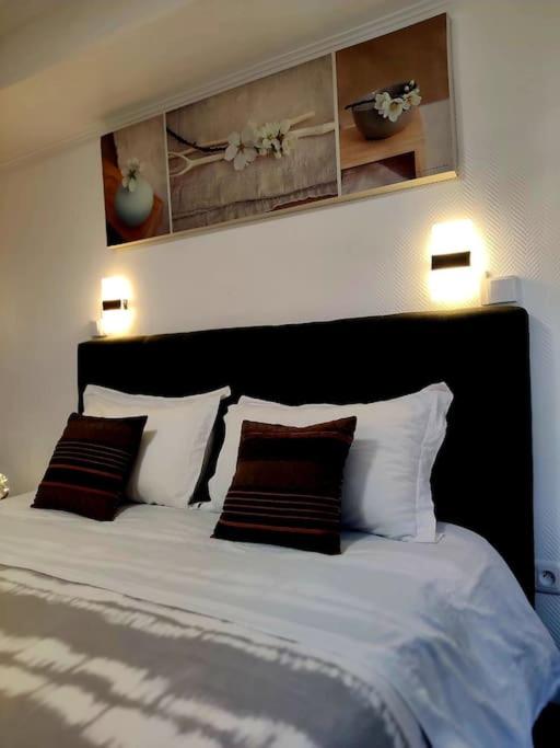 Łóżko lub łóżka w pokoju w obiekcie - 1 - Appartement charmant moderne 5 pers T3 73m2