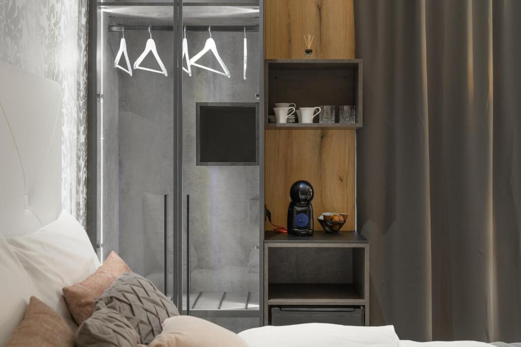 Postel nebo postele na pokoji v ubytování ROYAL SUITE, Ljubljana