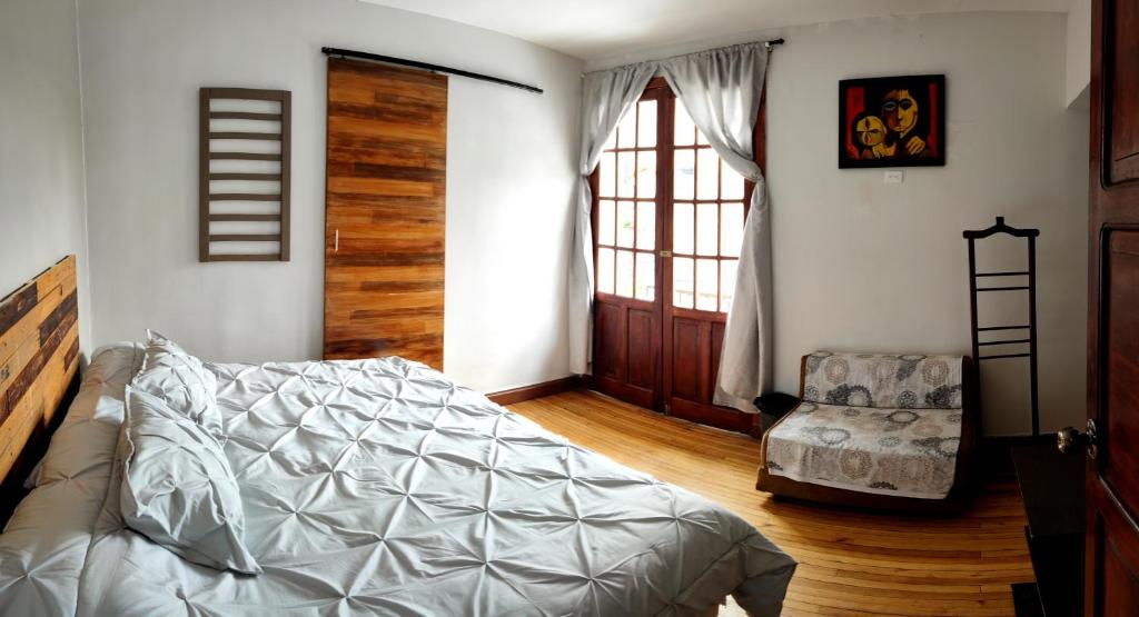 Postel nebo postele na pokoji v ubytování Minka Hostel