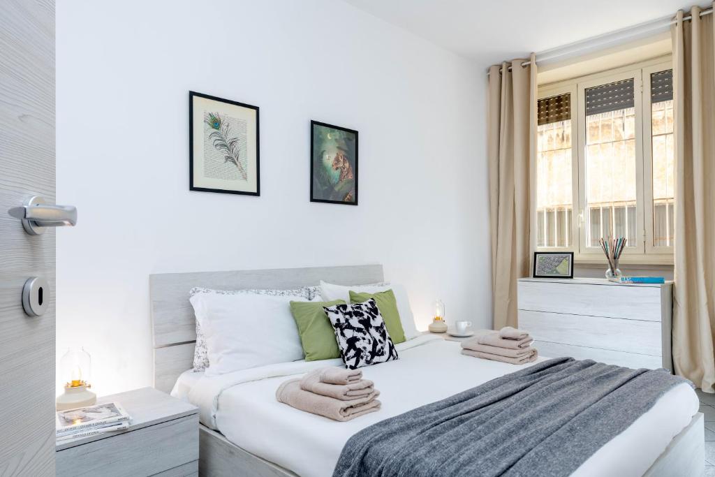 Posteľ alebo postele v izbe v ubytovaní Sweet Home in Laterano