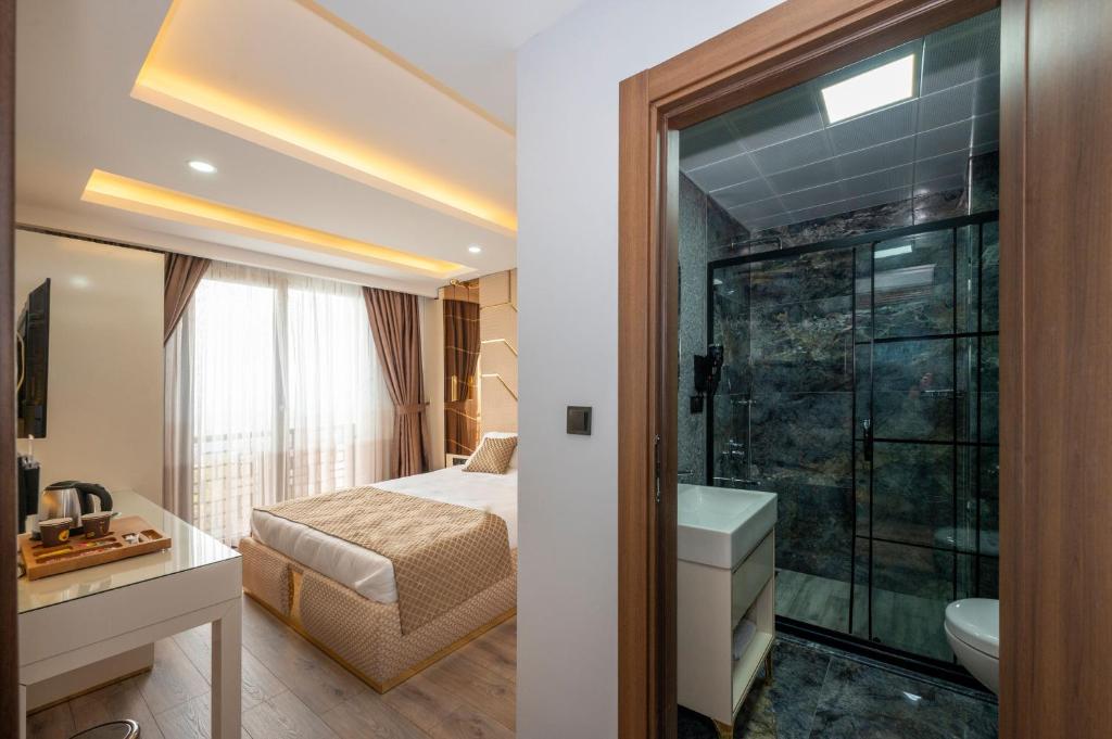 Cama ou camas em um quarto em Luxury Airport Hotel By Zazzoni-İstanbul Airport
