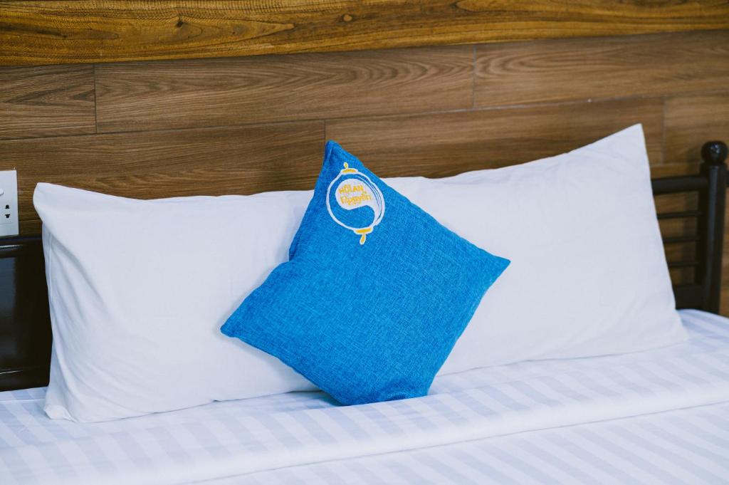 Postel nebo postele na pokoji v ubytování Hoi An Nguyen Homestay