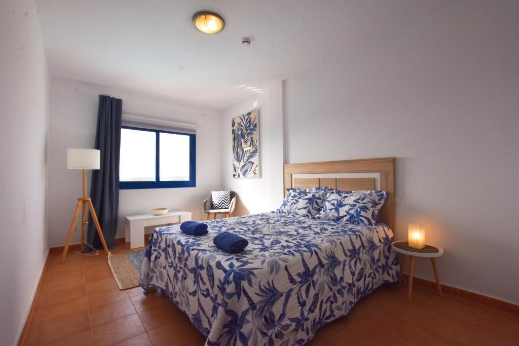 A bed or beds in a room at Book Jet - Costa Calma Sun & Pool