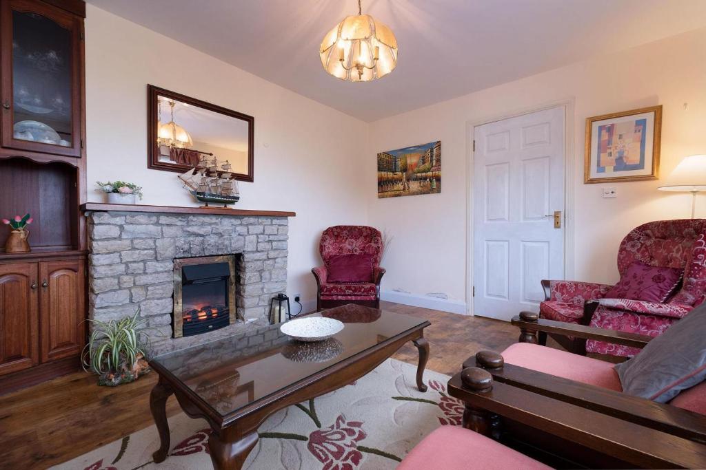 Posezení v ubytování Cottage 431 - Oughterard