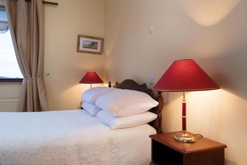 Postel nebo postele na pokoji v ubytování Cottage 431 - Oughterard