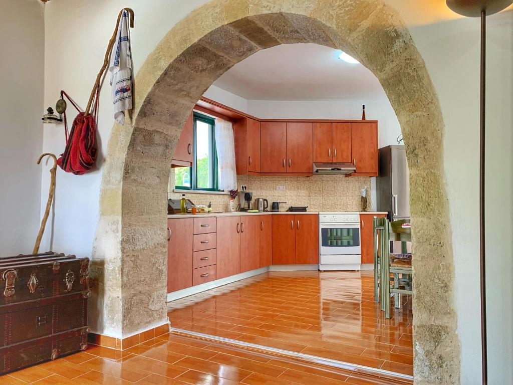 Kuchyň nebo kuchyňský kout v ubytování Evaggelias Home Gavalochori