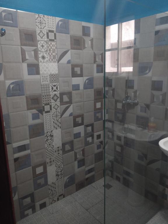 Koupelna v ubytování M & L Shared Apartment