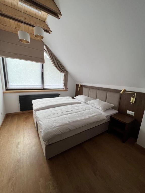 Łóżko lub łóżka w pokoju w obiekcie Jabłonki Resort&Spa