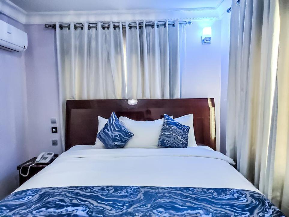 Postel nebo postele na pokoji v ubytování Medallion Hotels