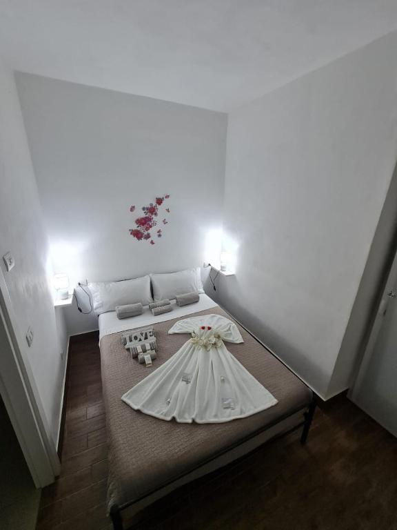 Postel nebo postele na pokoji v ubytování Curti Granda