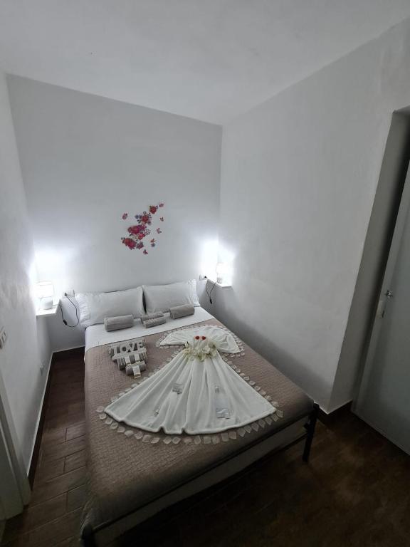 Postel nebo postele na pokoji v ubytování Curti Granda