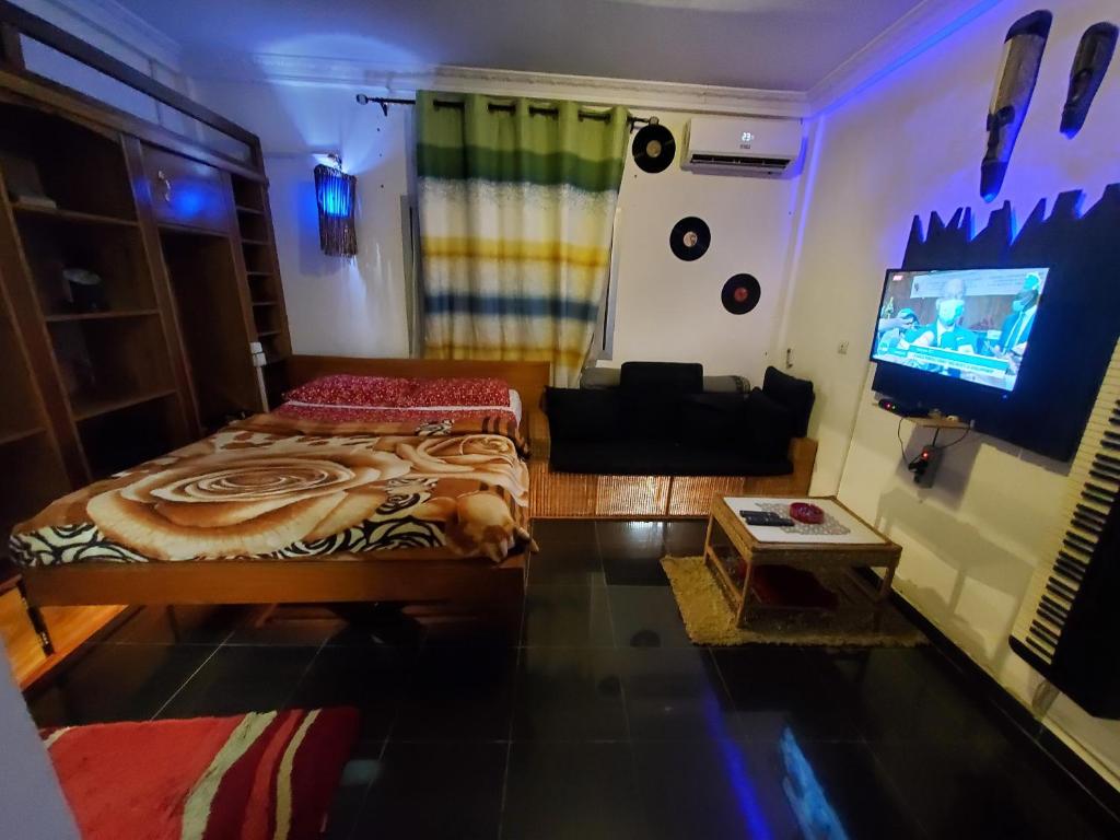 TV a/nebo společenská místnost v ubytování The Yafé Bastos 3