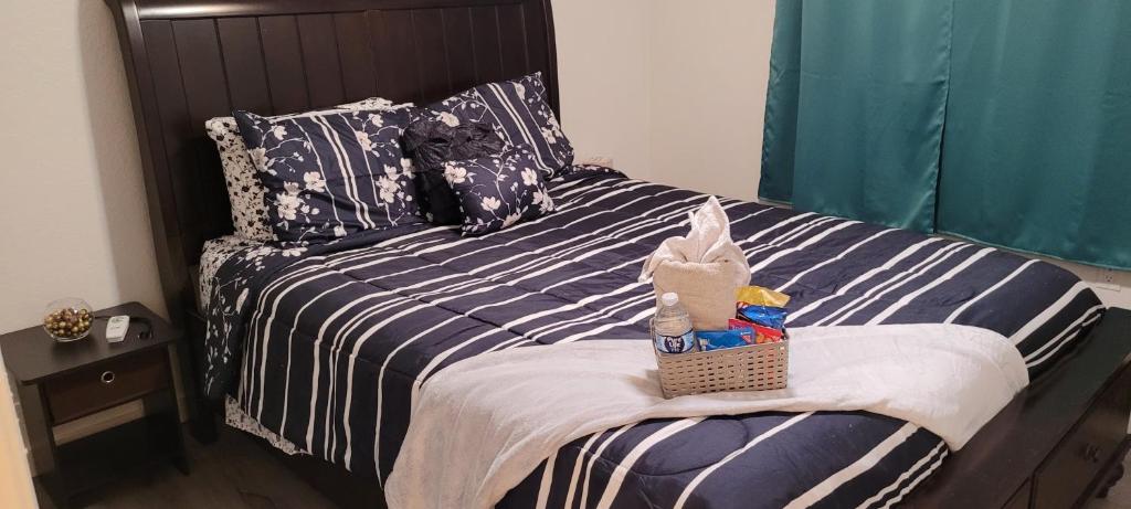 A bed or beds in a room at Be Our Guest-Shared Home Tampa