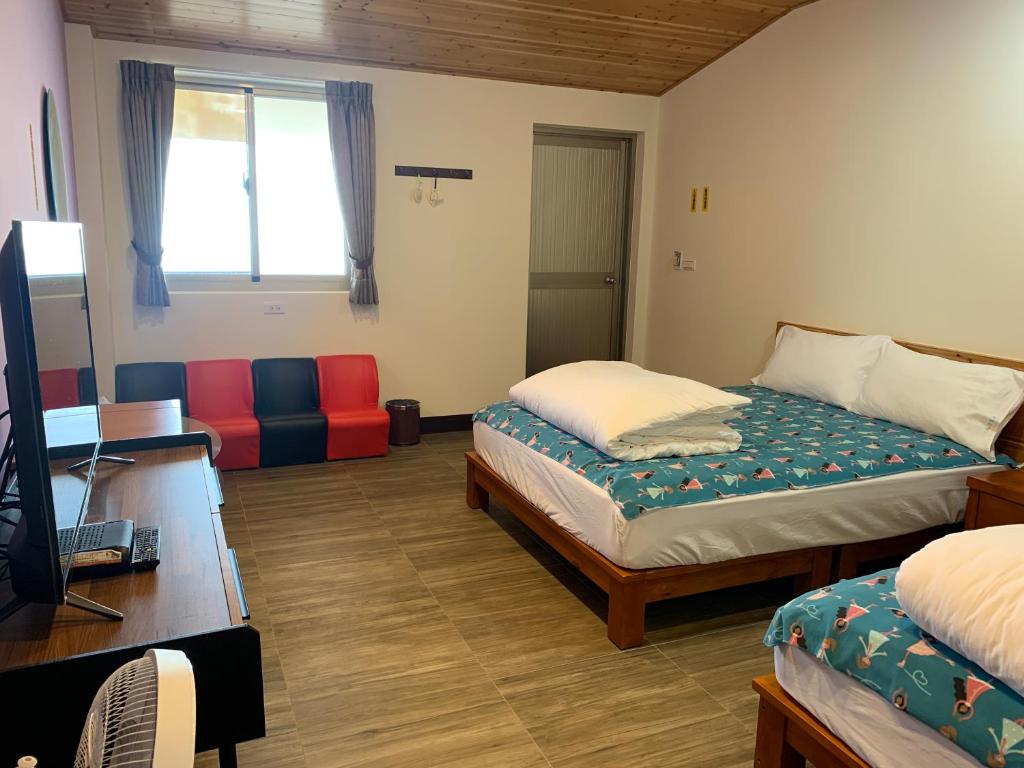 Postel nebo postele na pokoji v ubytování Tianen Farm