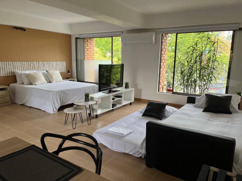 Voodi või voodid majutusasutuse Poblado Park Apartamento-Estudio toas