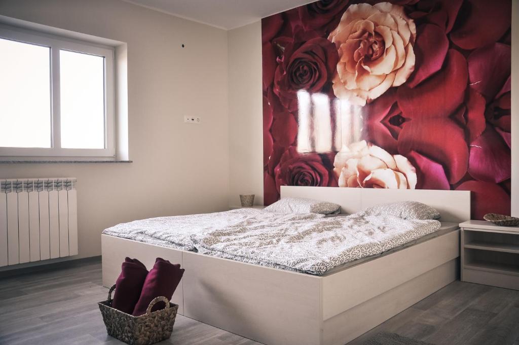 Postel nebo postele na pokoji v ubytování Rosa Bed and Breakfast