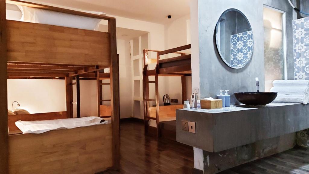 Postel nebo postele na pokoji v ubytování Sok Hotel And Coffee Siem Reap