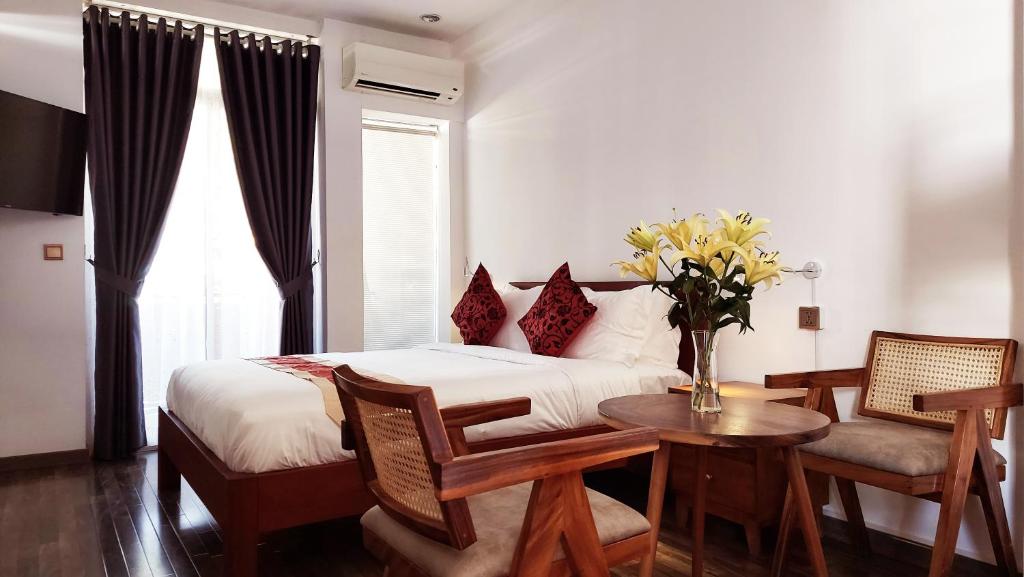 Posezení v ubytování Sok Hotel And Coffee Siem Reap