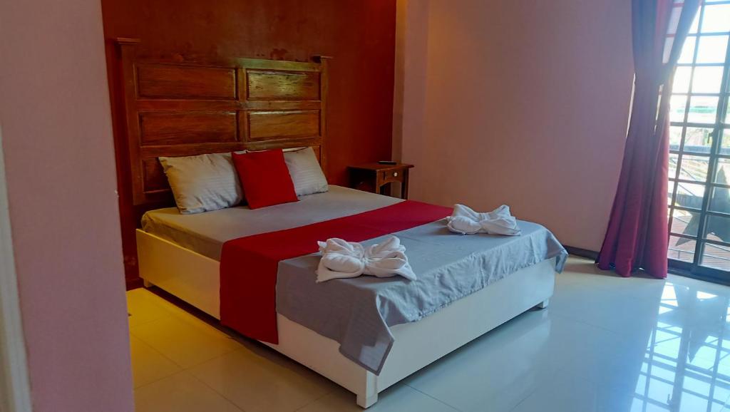 Postel nebo postele na pokoji v ubytování Answer hotel