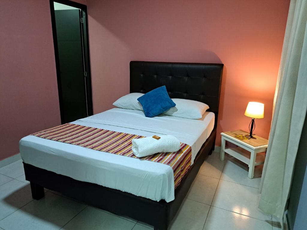 Postel nebo postele na pokoji v ubytování Hotel 9-25