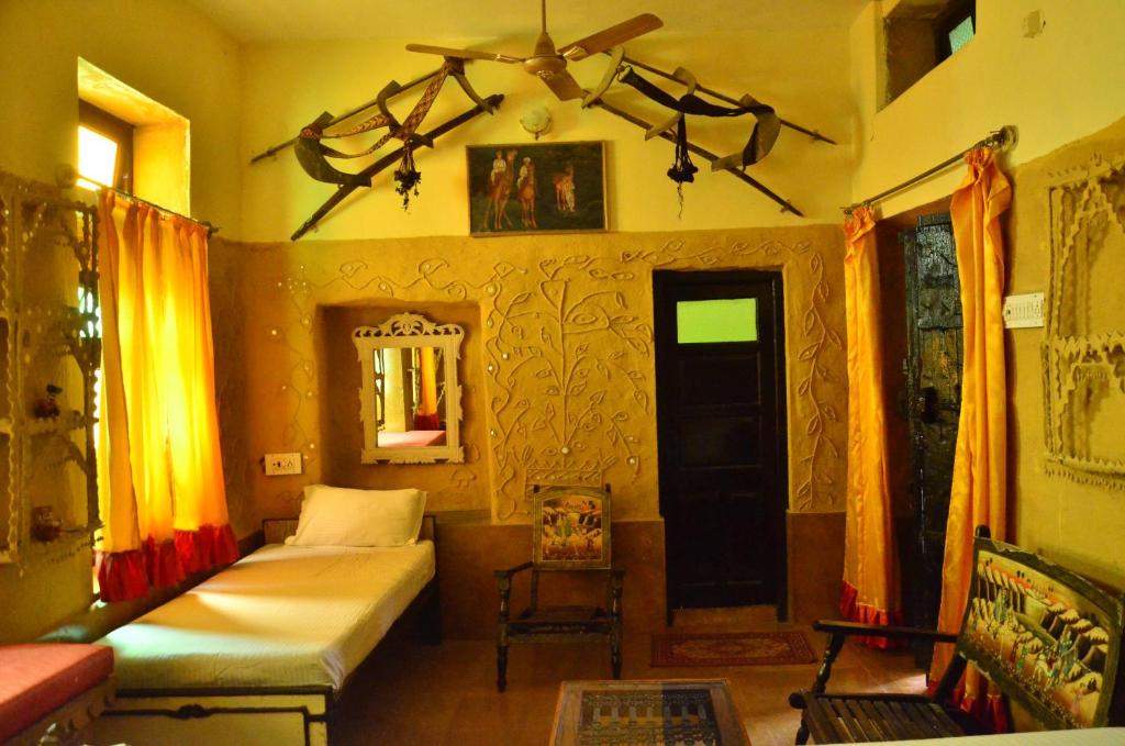 Postel nebo postele na pokoji v ubytování Deepak Rest House