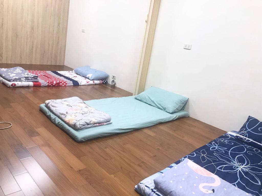 Postel nebo postele na pokoji v ubytování 枋寮枋居背包客棧Fang Ju Backpackers