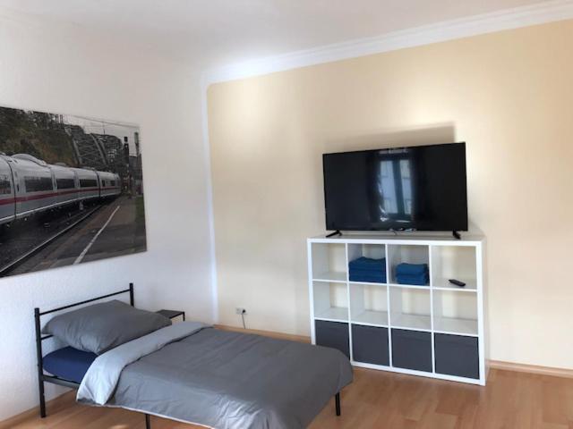 TV a/nebo společenská místnost v ubytování Ferienwohnung Nordluft