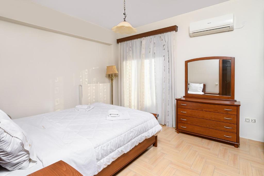 Łóżko lub łóżka w pokoju w obiekcie 4 Seasons Home