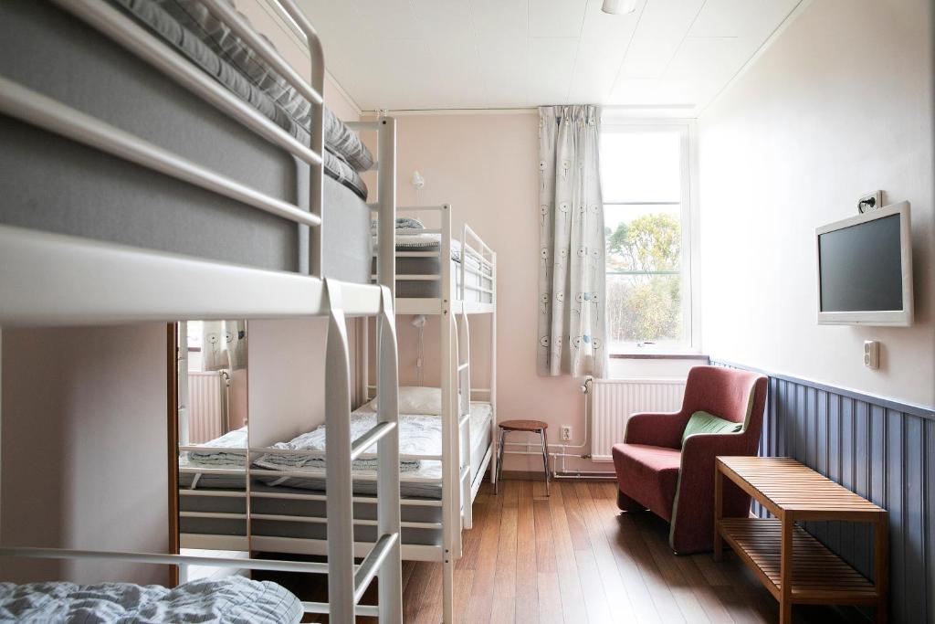 Postel nebo postele na pokoji v ubytování Kvibergs Vandrarhem - Hostel