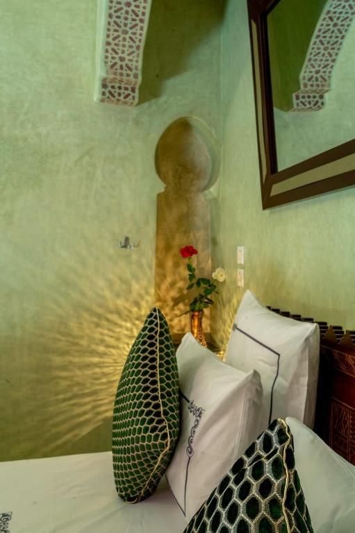 Postel nebo postele na pokoji v ubytování Riad Rêves D'orient & Spa