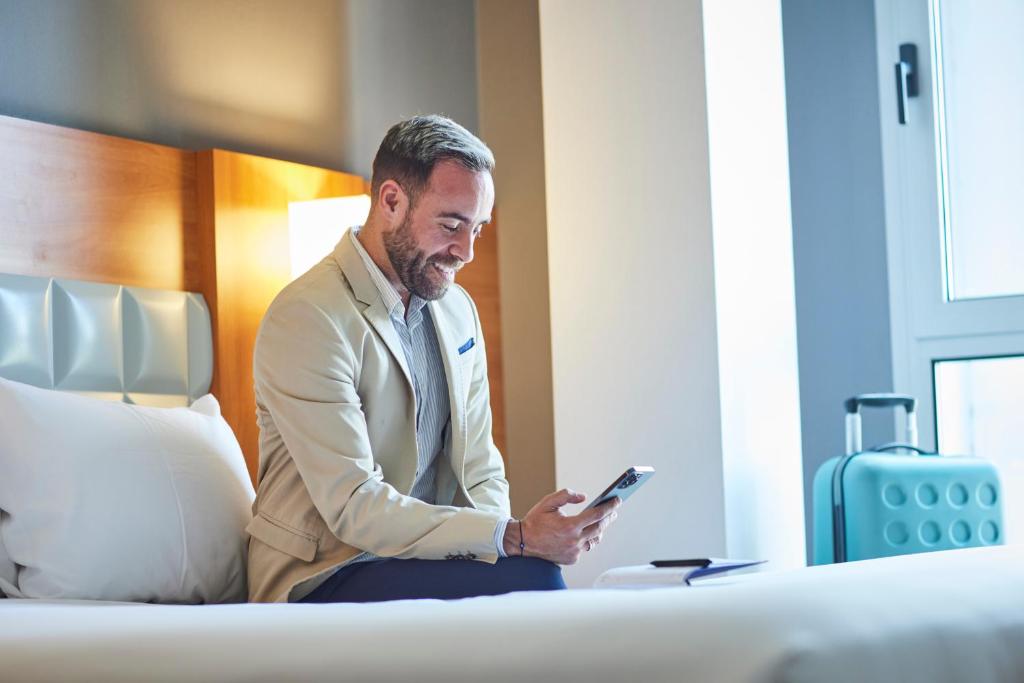 Posteľ alebo postele v izbe v ubytovaní Barcelona Century Hotel