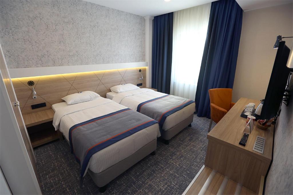 DES'OTEL - Doppel- Oder Zwillingszimmer Mit Blick Auf Die Stadt