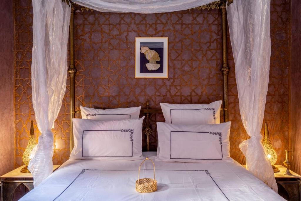 Postel nebo postele na pokoji v ubytování Riad Rêves D'orient & Spa