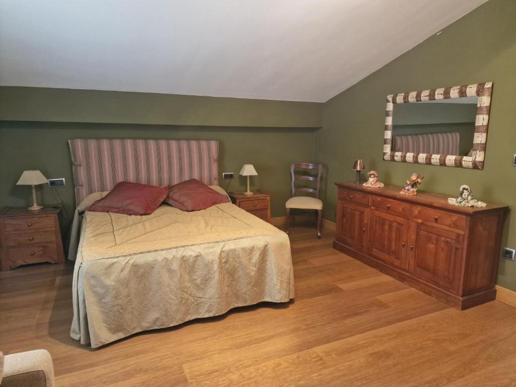 Postel nebo postele na pokoji v ubytování Hostal Lizuniaga