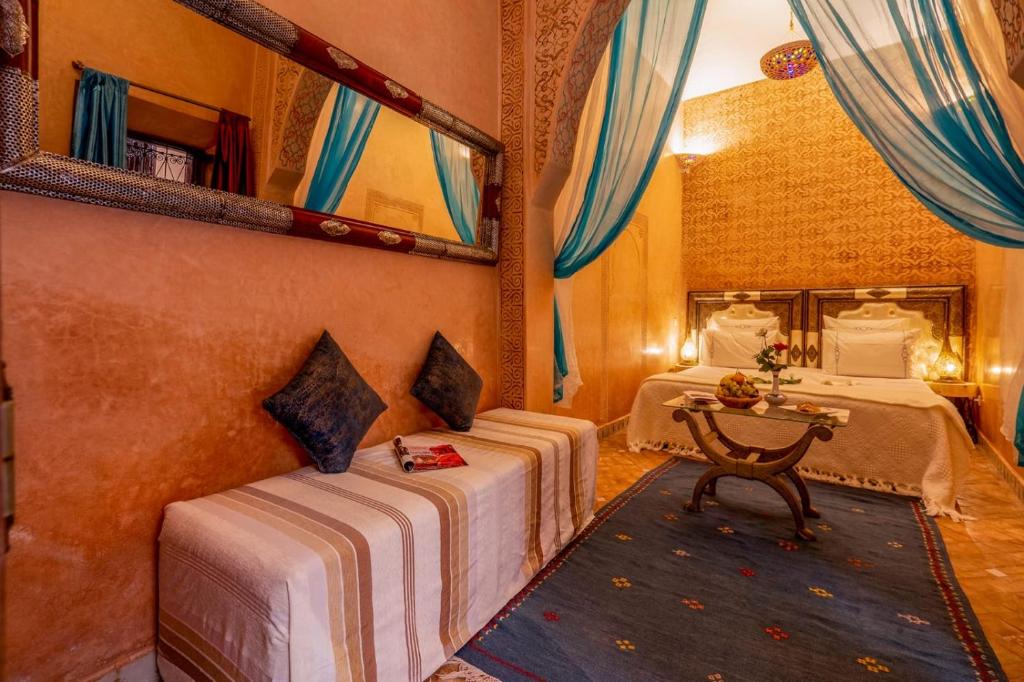 Postel nebo postele na pokoji v ubytování Riad Rêves D'orient & Spa