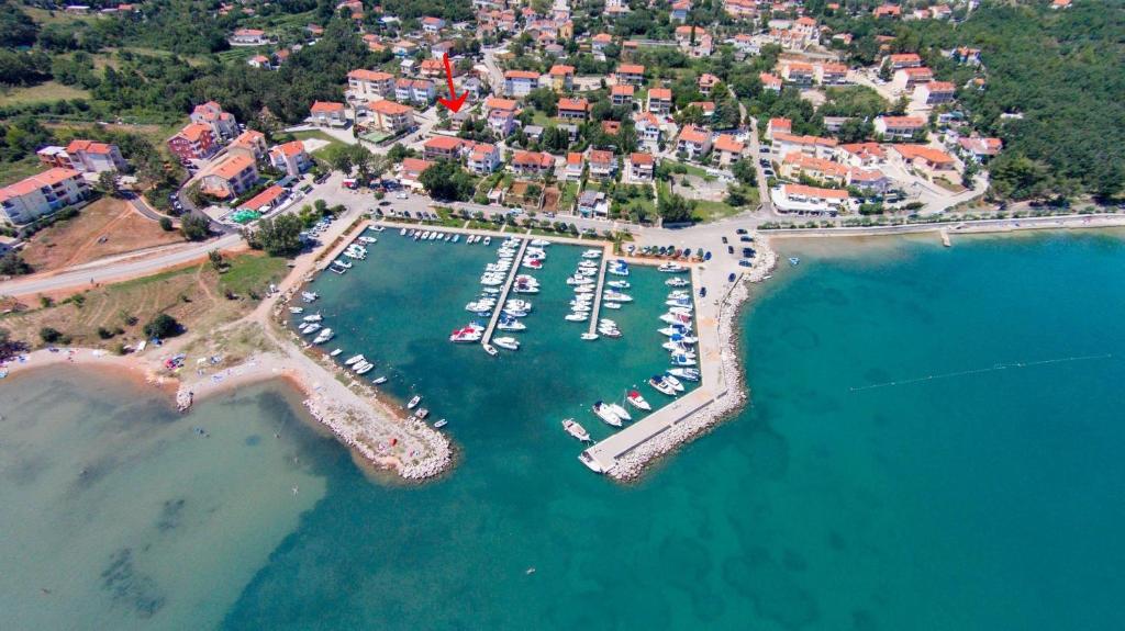 an aerial view of a harbor with boats in the water at Apartments Vila Nidisa in Čižići