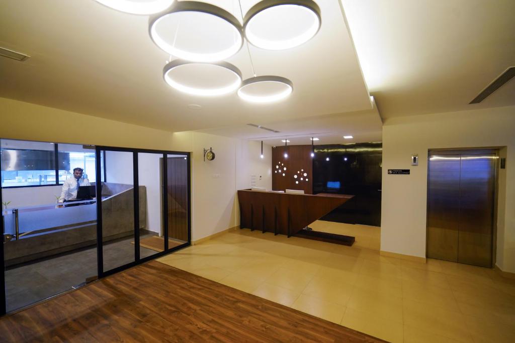 Postel nebo postele na pokoji v ubytování Lantern Apart Hotel