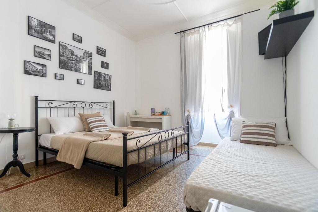 Postel nebo postele na pokoji v ubytování Zaira b&b