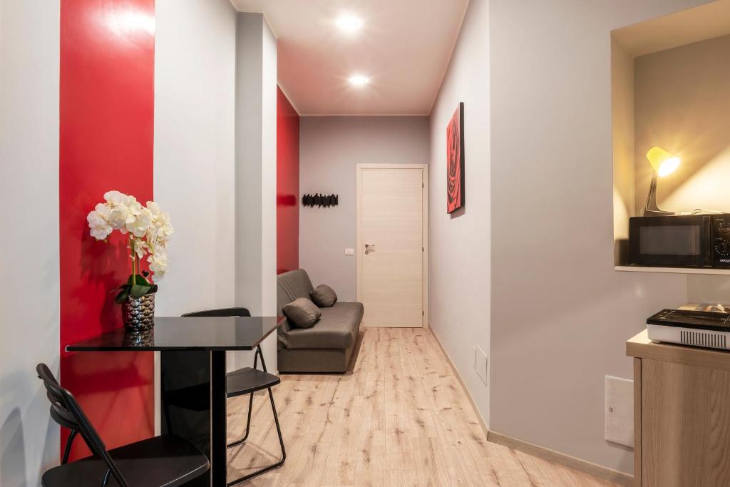 A kitchen or kitchenette at Clodia Apartments