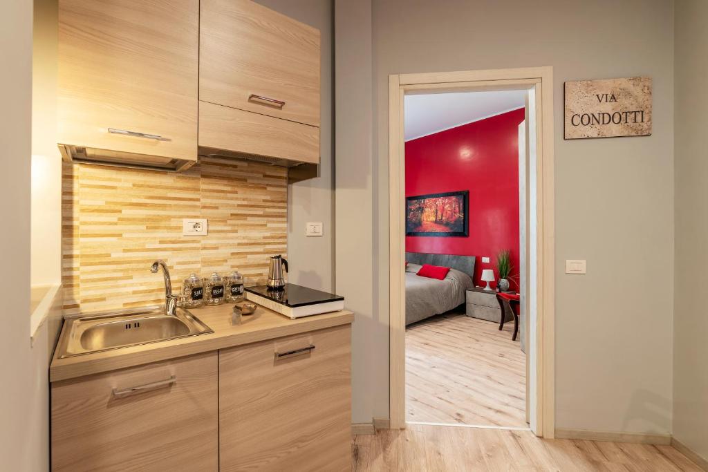 A kitchen or kitchenette at Clodia Apartments