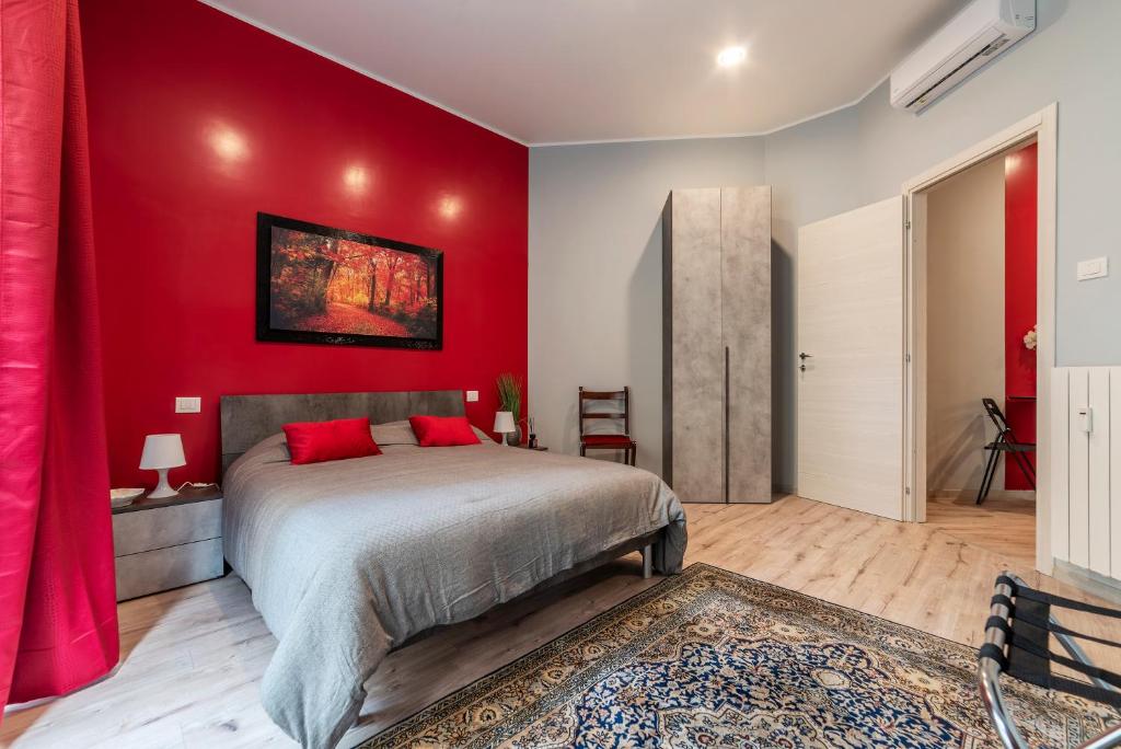 A bed or beds in a room at Clodia Apartments