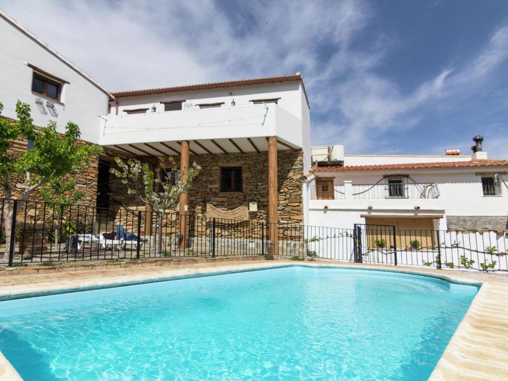 The swimming pool at or close to Belvilla by OYO San Marcos