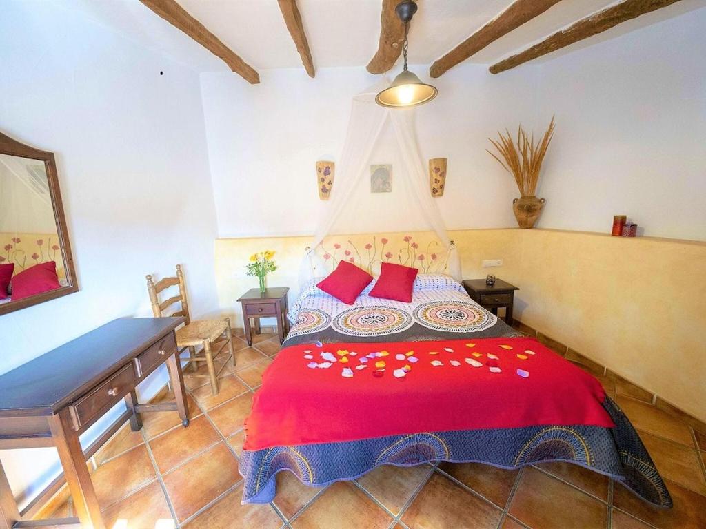 A bed or beds in a room at Belvilla by OYO San Marcos