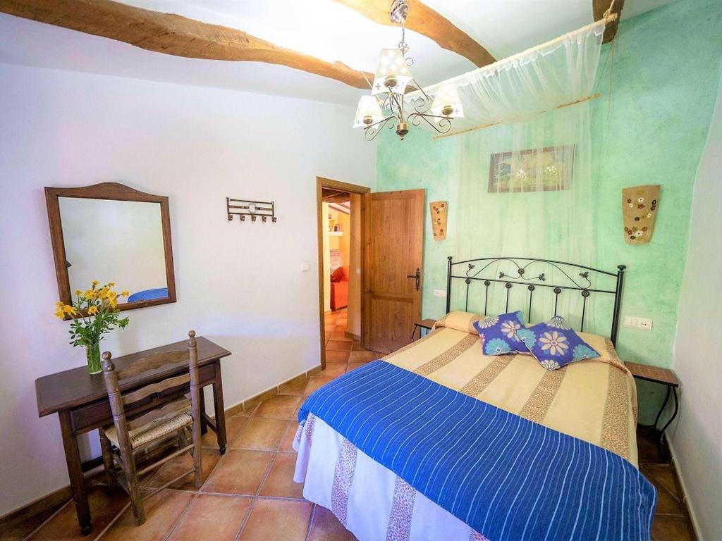 A bed or beds in a room at Belvilla by OYO San Marcos