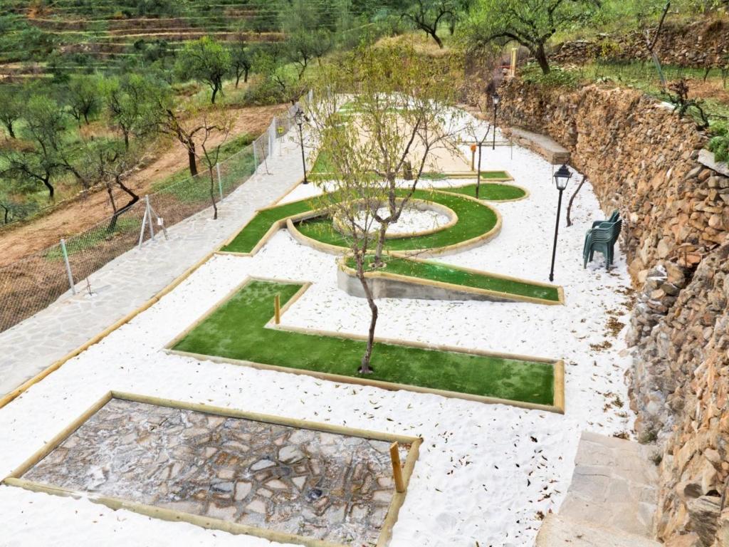 A garden outside Belvilla by OYO San Marcos