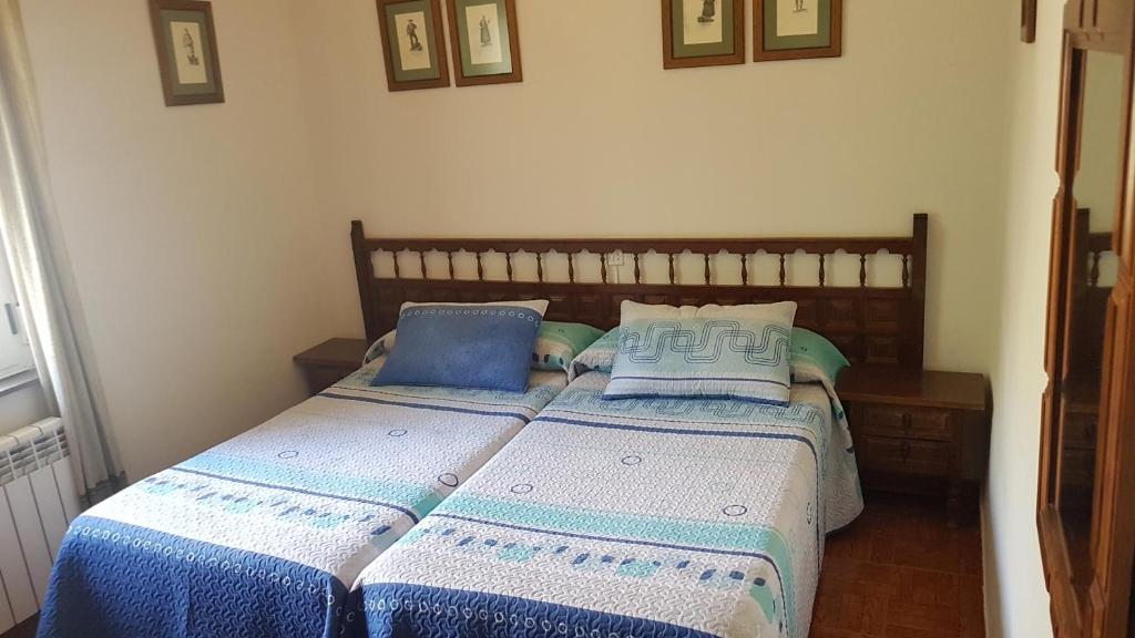 Postel nebo postele na pokoji v ubytování La Vista de Gredos III