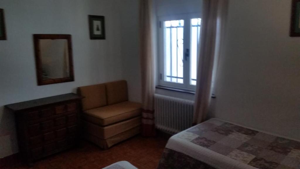 Postel nebo postele na pokoji v ubytování La Vista de Gredos III