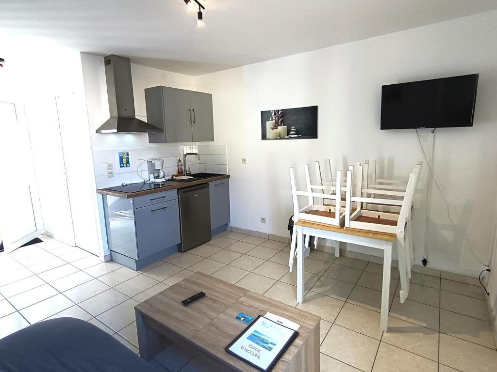 Η κουζίνα ή μικρή κουζίνα στο Le Duplex t2 étoilé